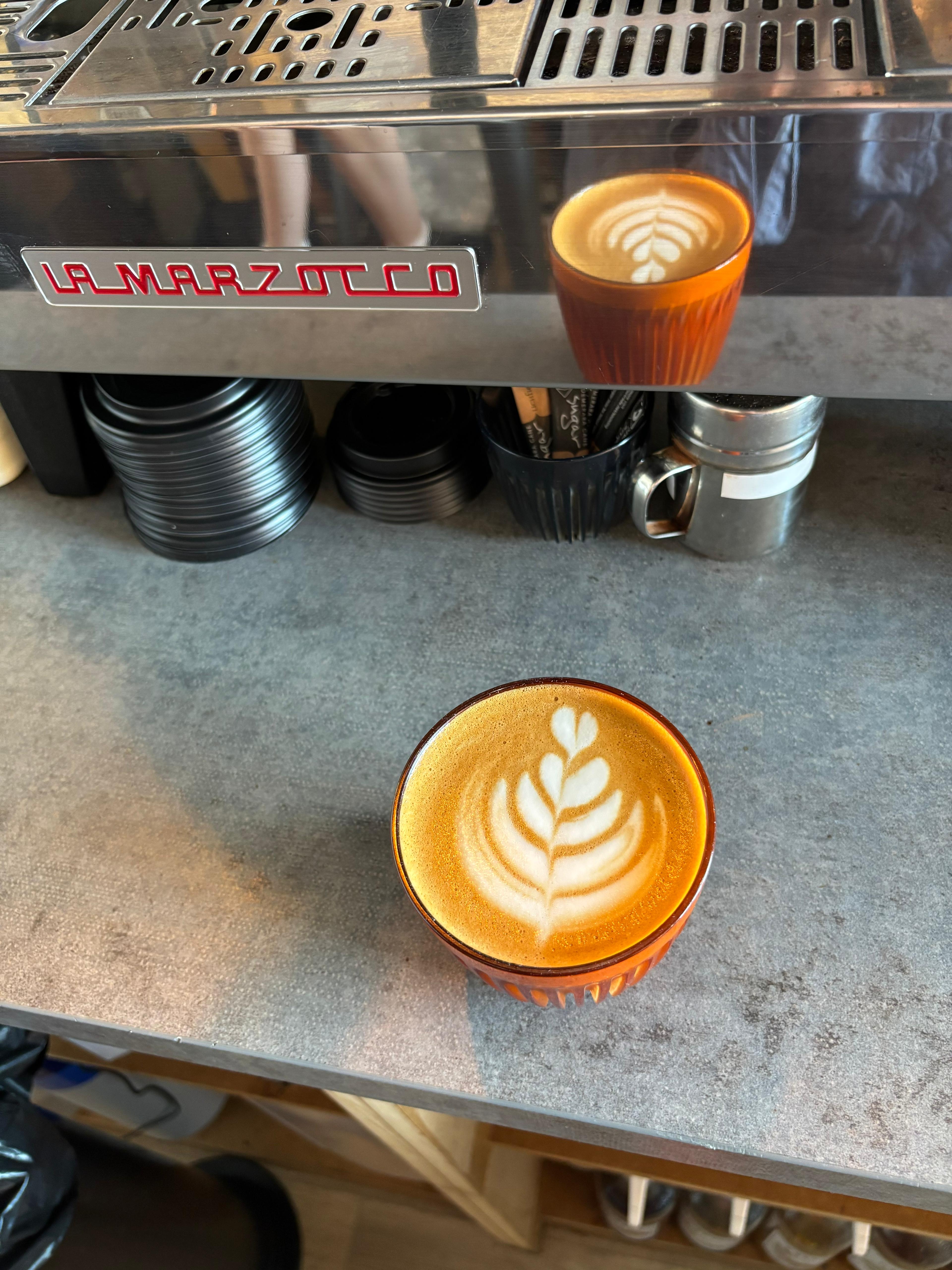Barista pouring latte art